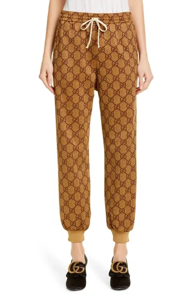 Gucci Gg Print Technical Jersey Jogger Pants In Brown