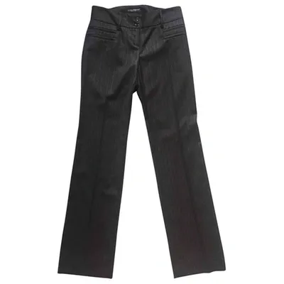 Pre-owned Dolce & Gabbana Wool Trousers In Black