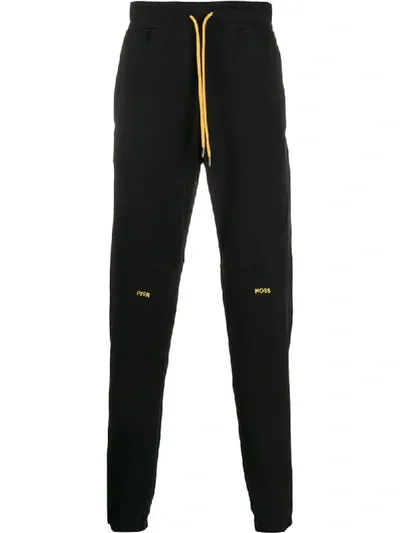 Pyer Moss Embroidered Logo Track Pants In Black