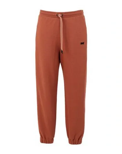 Victoria Beckham French Cotton-terry Track Pants In Brick Red