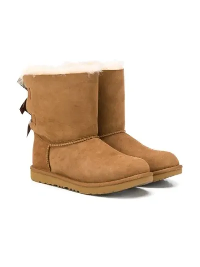 Ugg Teen Bow Detail Shearling Boots In Brown