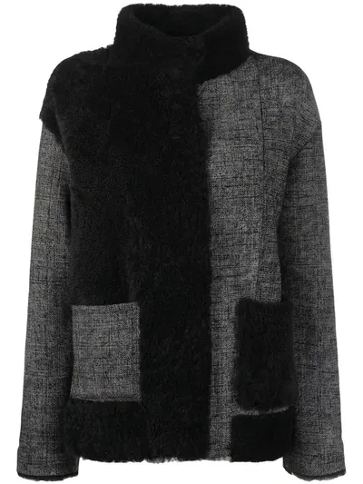 Suprema Panelled Shearling Jacket In Black