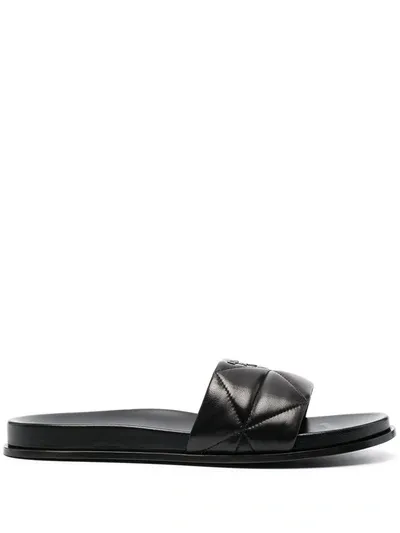 Prada Lettering Logo Quilted Slides In Black