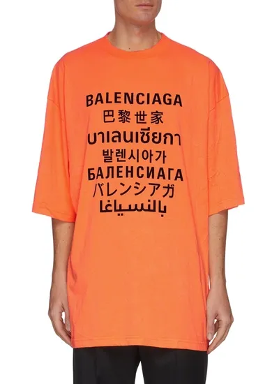 Balenciaga Multi Language Logo Print Cotton T-shirt In Orange