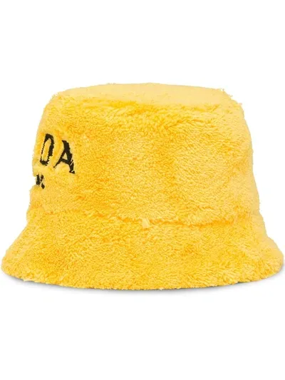 Prada Embroidered-logo Bucket Hat In Gelb