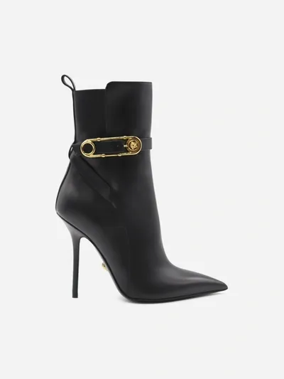 Versace Safety Pin Leather Stiletto Booties In Black