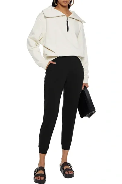 Alice And Olivia Nyc Cropped Fleece Track Pants In Black