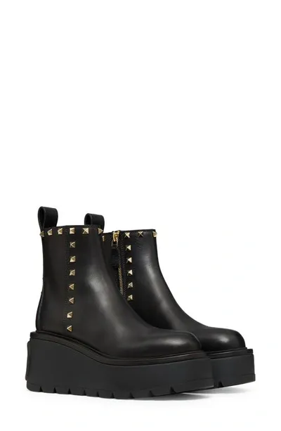 Valentino Garavani Uniqueform Studded Leather Boots With Oversize Sole In Black