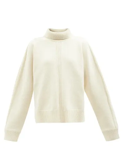 Jil Sander Slit-back Roll-neck Wool-blend Sweater In Beige