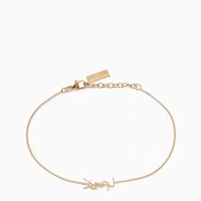 Saint Laurent Gold-tone Brass Charm Bracelet In Metal