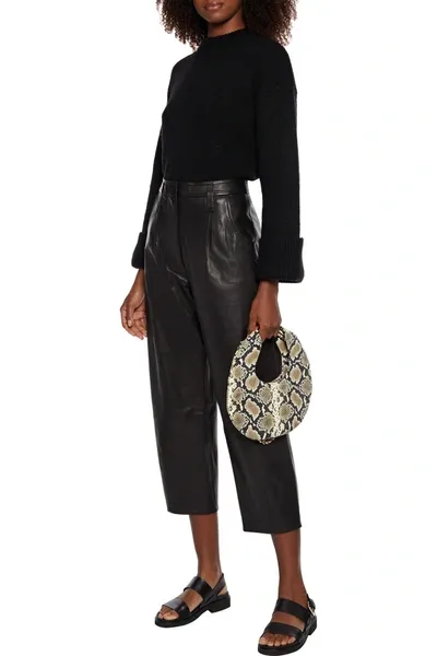 Frame Cropped Pleated Leather Tapered Pants In Black