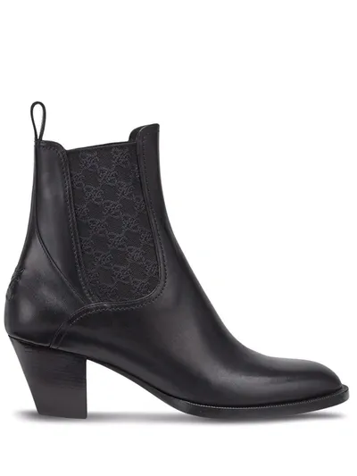 Fendi Tronchetto Ankle Boots In Black