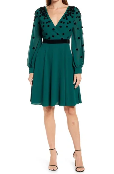 Shani Flocked Velvet Surplice Dress In Green