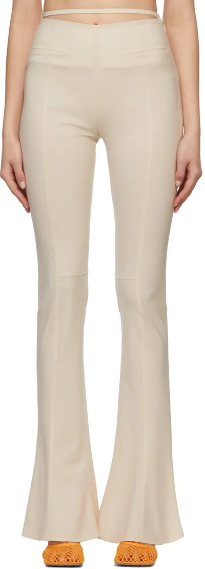 Jacquemus Le Pant Tangelo Flared High-rise Stretch-wool Trousers In Brown