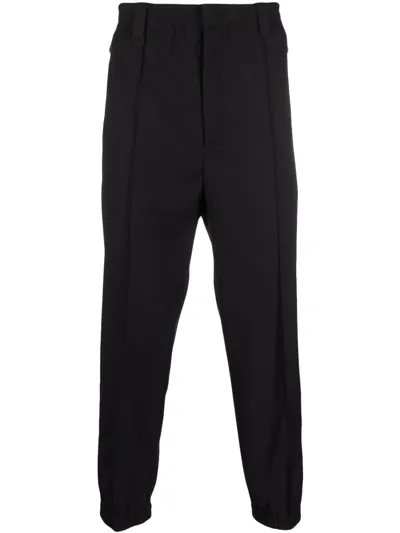 Emporio Armani Cropped Cotton Track Pants In Schwarz