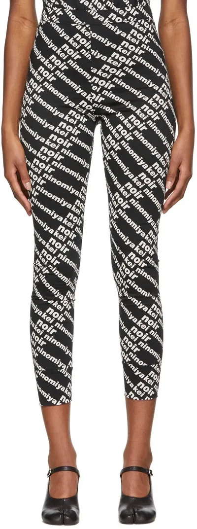 Noir Kei Ninomiya Logo Printed Cotton Jersey Sweatpants In Black