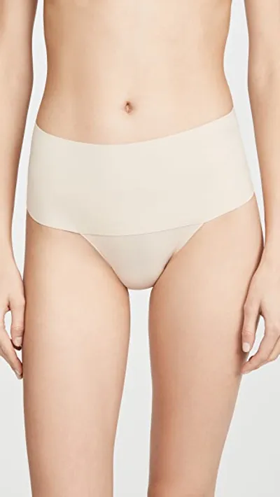 Spanx Undie -tectable Thong Soft Almond M In Tan/beige