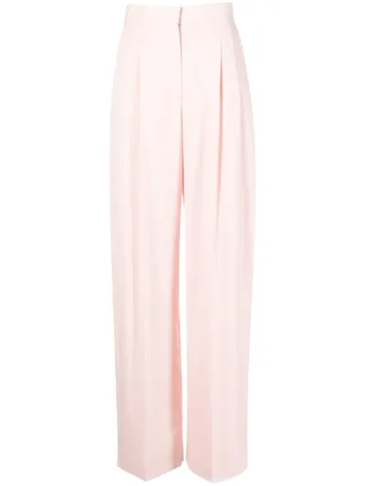 Alexander Mcqueen Pleat-detail Tailored Trousers In Rosa