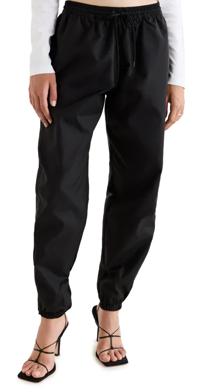 Wardrobe.nyc Relaxed-fit Tapered-leg Mid-rise Shell Trousers In Black