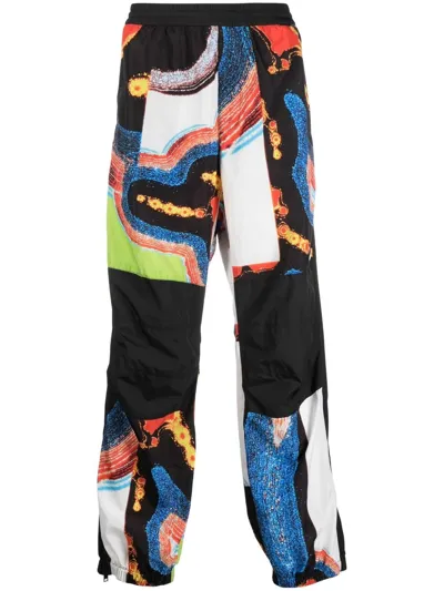 Ambush Abstract-pattern Paneled Track Pants In Schwarz