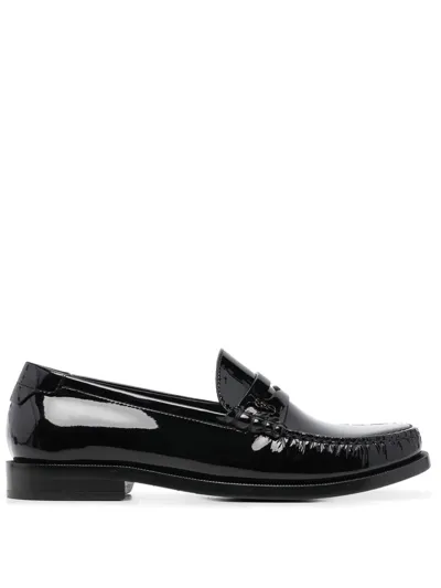 Saint Laurent Logo-plaque Leather Penny Loafers In Nero