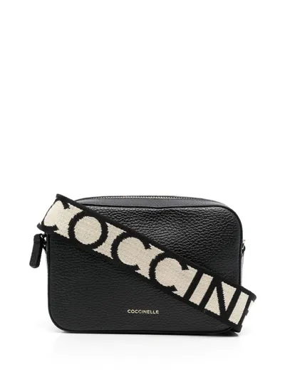 Coccinelle Tebe Logo-strap Pebbled Shoulder Bag In Black