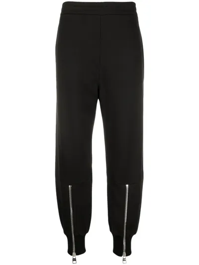 Alexander Mcqueen Zip-detail Tapered Track Pants In Black