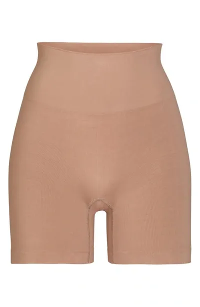 Skims Soft Smoothing Shorts In Brown