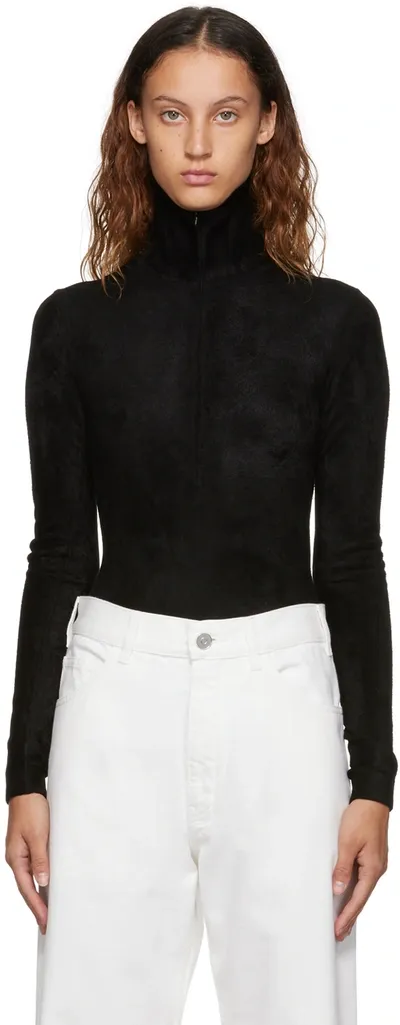 Alaïa Wool-blend Turtleneck Sweater In Black