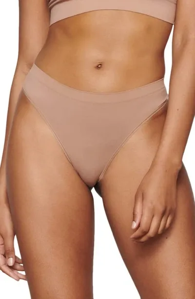 Skims Soft Smoothing Thong In Sienna