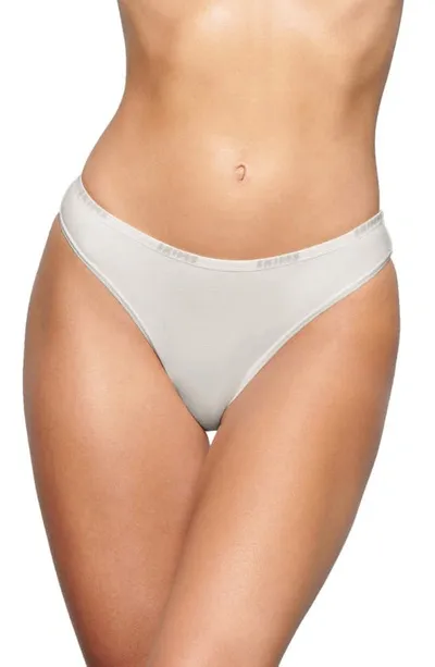 Skims Logo Trim Stretch Cotton Bikini In Marble