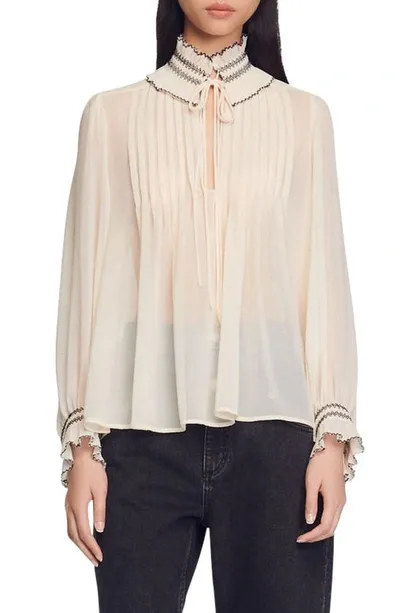 Sandro Jacinthe Frilled-neck Pleated Chiffon Blouse In Natural