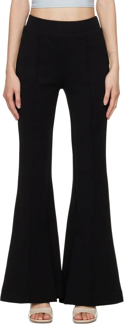 Frame Stretch-knit Flared Pants In Black