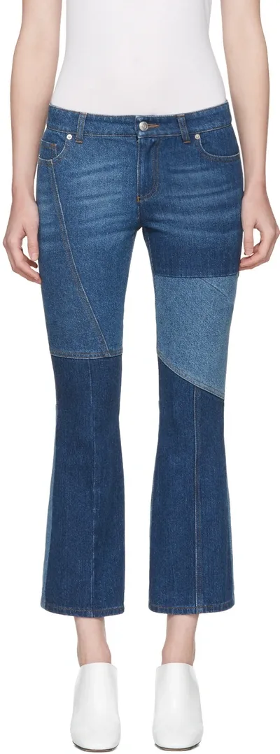 Alexander Mcqueen Patchwork Cropped Mid-rise Flared Jeans In Denim