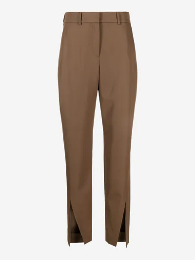 Balmain Slit-detail Wool Tapered Trousers In Brown