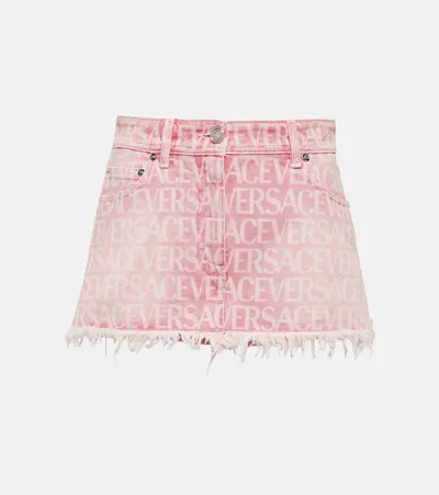 Versace Allover Denim Miniskirt In Pink