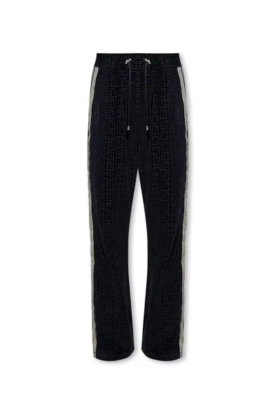 Balmain Monogrammed Velvet Joggers In Navy