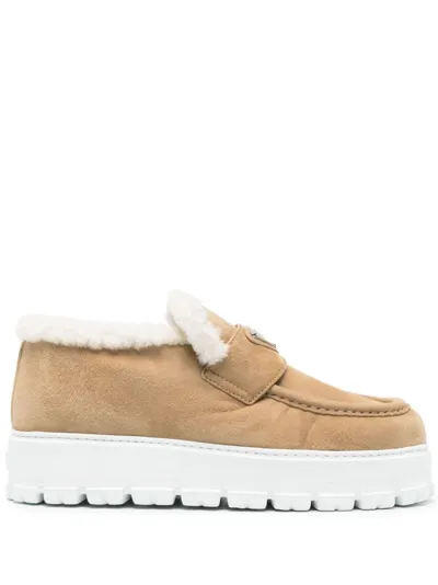 Prada Shearling Lined Suede Platform Loafers In Beige