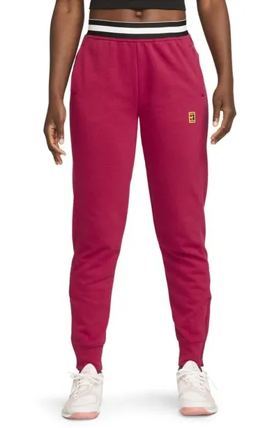 Nike Court Dri-fit Heritage Fleece Pants In Red