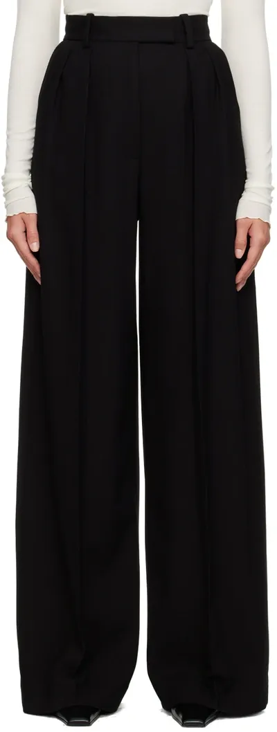 Khaite Teyana Pleated Wide-leg Pants In Black