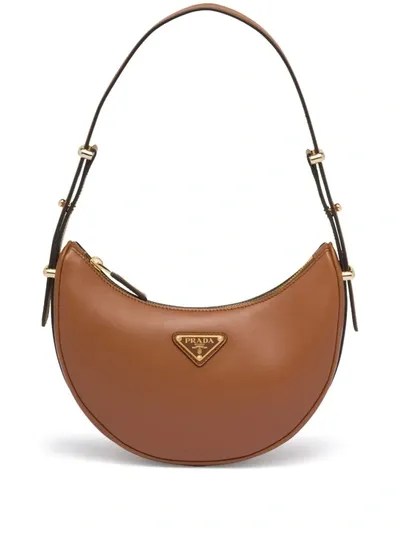 Prada Logo Plaque Shoulder Bag In Brown