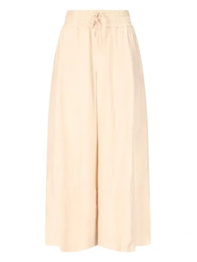 Jil Sander Elastic Waisted Wide Leg Pants In Off White