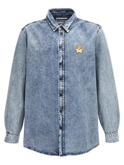 Moschino Teddy Logo Embroidered Buttoned Denim Shirt In Azul Claro