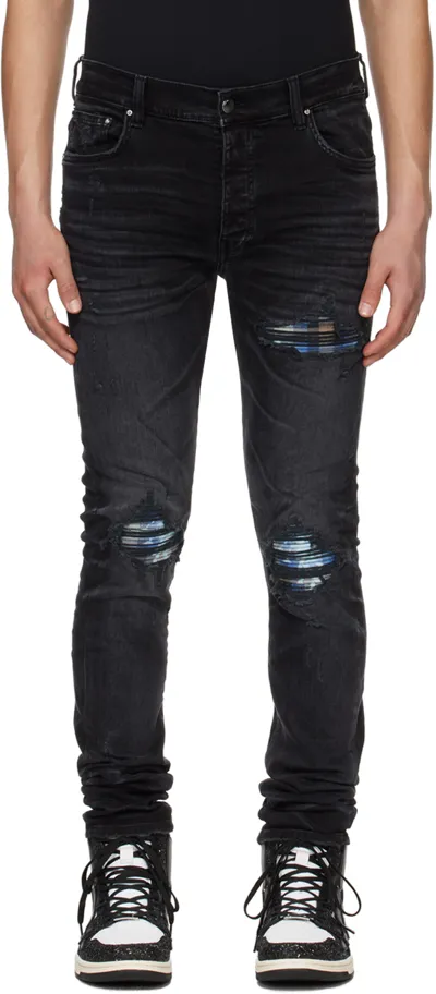 Amiri Distressed Denim Jeans In Black