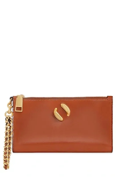 Rebecca Minkoff Infinity Chain Strap Leather Wristlet In Cognac