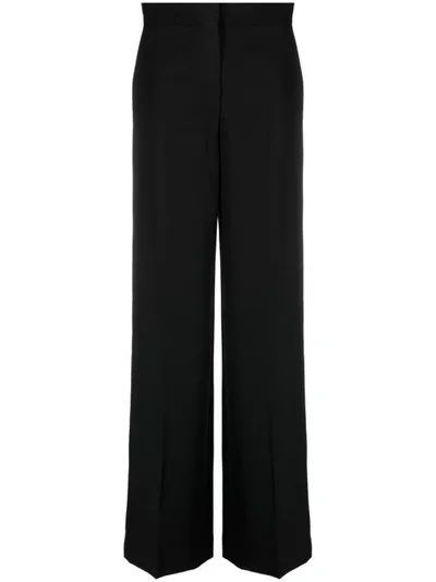 Rev The Stewart Virgin Wool Trousers In Black