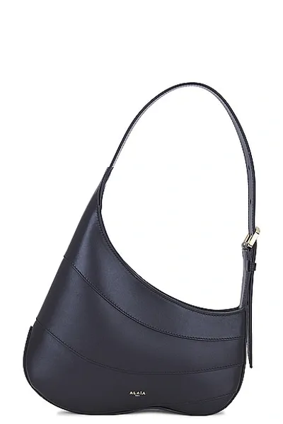 Alaïa Djinn Zipped Hobo Bag In Black