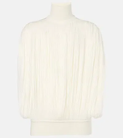 Alaïa Fringed Wool Turtleneck Sweater In White