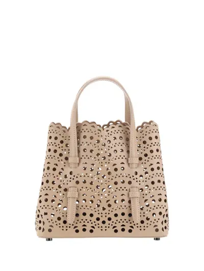 Alaïa Mina 20 Handbag In Beige