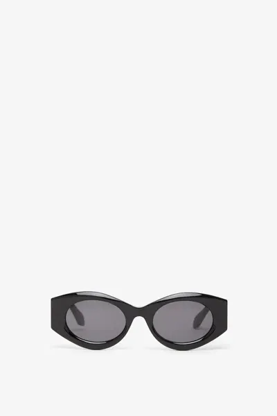 Alaïa Oval 82 Black Sunglasses